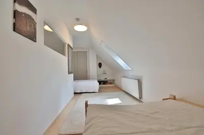 Ein Bett oder Betten in einem Zimmer der Unterkunft Haus Kastanienallee 3 Haus Kastanienallee 3 Appartement 8