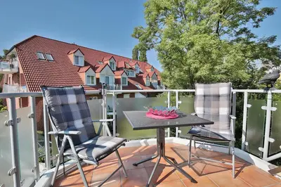 Ein Balkon oder eine Terrasse in der Unterkunft Wohnpark am Mühlenteich Wohnpark am Mühlenteich Appartement 46