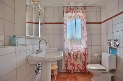 Ein Badezimmer in der Unterkunft Wohnpark am Mühlenteich Wohnpark am Mühlenteich Appartement 46