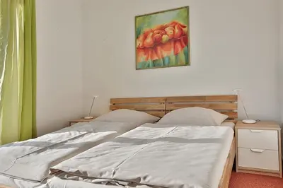 Ein Bett oder Betten in einem Zimmer der Unterkunft Ferienhaus Gorch-Fock-Str 37 Ferienhaus Gorch-Fock-Str 37