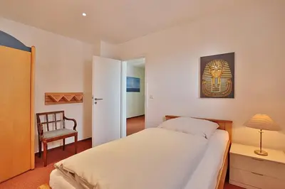 Ein Bett oder Betten in einem Zimmer der Unterkunft Ferienhaus Gorch-Fock-Str 37 Ferienhaus Gorch-Fock-Str 37