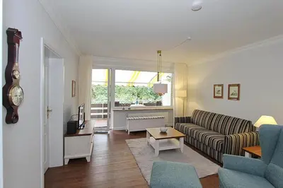 Ein Sitzbereich in der Unterkunft Die Insel Die Insel Appartement 210