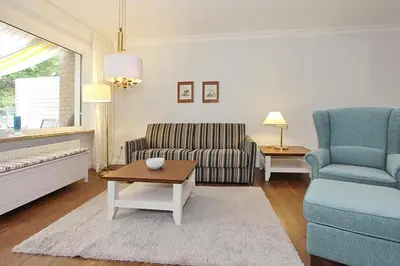 Ein Sitzbereich in der Unterkunft Die Insel Die Insel Appartement 210