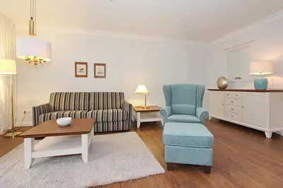 Ein Sitzbereich in der Unterkunft Die Insel Die Insel Appartement 210