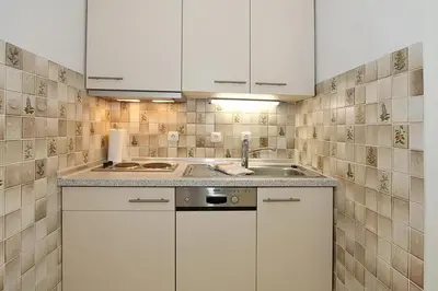 Küche/Küchenzeile in der Unterkunft Die Insel Die Insel Appartement 210