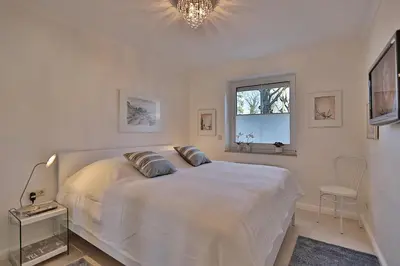 Ein Bett oder Betten in einem Zimmer der Unterkunft Kurparkresidenz-Timmendorfer Strand Kurparkresidenz-Timmendorfer Strand Appartement 01