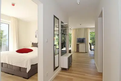 Ein Bett oder Betten in einem Zimmer der Unterkunft Villa Stern Villa Stern Appartement 03