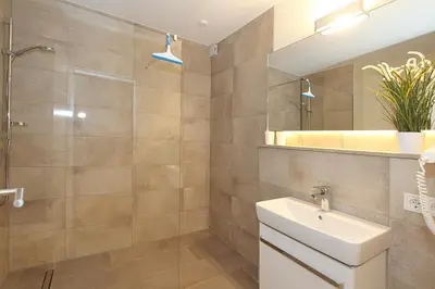 Ein Badezimmer in der Unterkunft Villa Stern Villa Stern Appartement 04