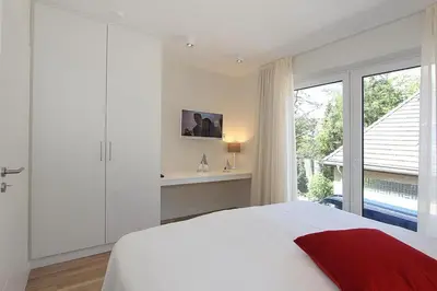 Ein Bett oder Betten in einem Zimmer der Unterkunft Villa Stern Villa Stern Appartement 05