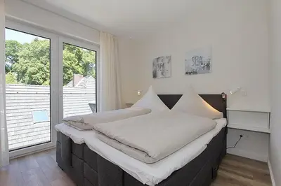 Ein Bett oder Betten in einem Zimmer der Unterkunft Villa Stern Villa Stern Appartement 09
