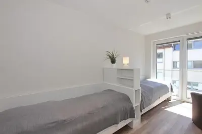 Ein Bett oder Betten in einem Zimmer der Unterkunft Villa Stern Villa Stern Appartement 11