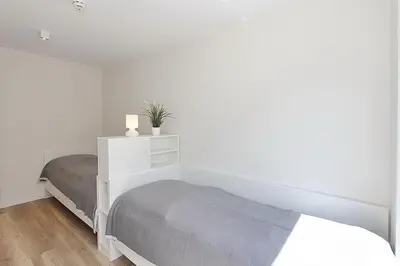 Ein Bett oder Betten in einem Zimmer der Unterkunft Villa Stern Villa Stern Appartement 11