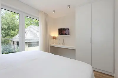 Ein Bett oder Betten in einem Zimmer der Unterkunft Villa Stern Villa Stern Appartement 12