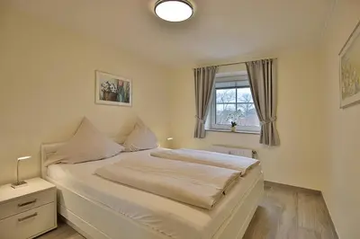 Ein Bett oder Betten in einem Zimmer der Unterkunft Kurparkresidenz-Timmendorfer Strand Kurparkresidenz-Timmendorfer Strand Appartement 27