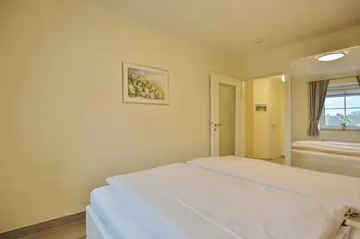 Ein Bett oder Betten in einem Zimmer der Unterkunft Kurparkresidenz-Timmendorfer Strand Kurparkresidenz-Timmendorfer Strand Appartement 27