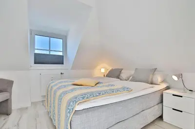 Ein Bett oder Betten in einem Zimmer der Unterkunft Haus Kurparkblick Haus Kurparkblick Appartement 11