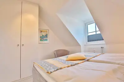 Ein Bett oder Betten in einem Zimmer der Unterkunft Haus Kurparkblick Haus Kurparkblick Appartement 11