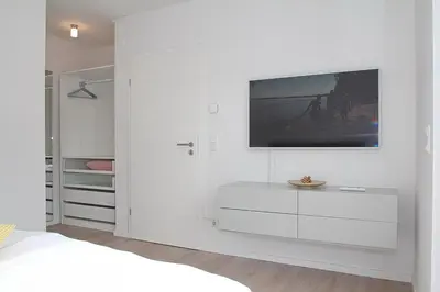 Ein Bett oder Betten in einem Zimmer der Unterkunft Ferienanlage Bergstrasse 6 Ferienanlage Bergstrasse 6 Appartement 7