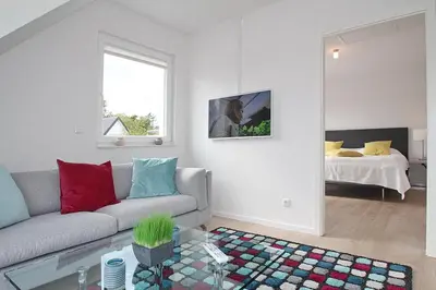 Ein Bett oder Betten in einem Zimmer der Unterkunft Ferienanlage Bergstrasse 6 Ferienanlage Bergstrasse 6 Appartement 7