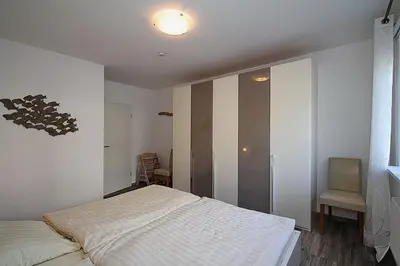 Ein Bett oder Betten in einem Zimmer der Unterkunft Haus Strandstrasse Strandstrasse 150 Appartement 3