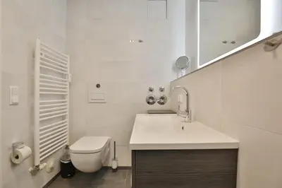 Ein Badezimmer in der Unterkunft Haus Strandstrasse Strandstrasse 150 Appartement 3