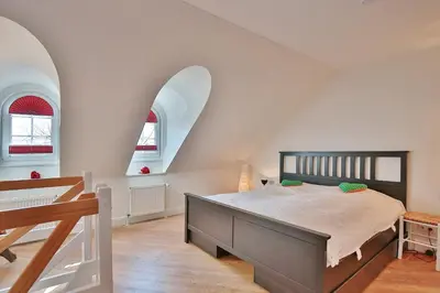 Ein Bett oder Betten in einem Zimmer der Unterkunft Ferienhaus Spitzbergen Ferienhaus Spitzbergen