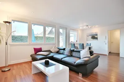 Ein Sitzbereich in der Unterkunft Emmas Seeappartements Emmas Seeappartements 01