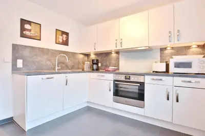 Küche/Küchenzeile in der Unterkunft Emmas Seeappartements Emmas Seeappartements 01