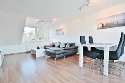 Ein Sitzbereich in der Unterkunft Emmas Seeappartements Emmas Seeappartements 02