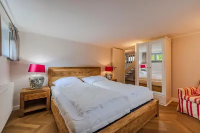 Ein Bett oder Betten in einem Zimmer der Unterkunft Ferienhaus Wohrbarg Ferienhaus Wohrbarg