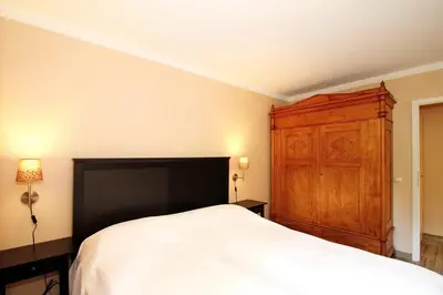 Ein Bett oder Betten in einem Zimmer der Unterkunft Wohnpark am Mühlenteich Wohnpark am Mühlenteich Appartement 07