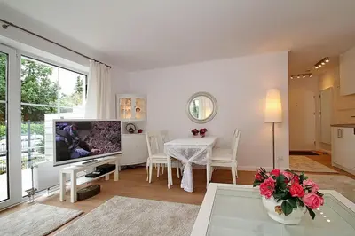 TV/Unterhaltungsangebot in der Unterkunft Modernes Strandhus Modernes Strandhus Appartement 109