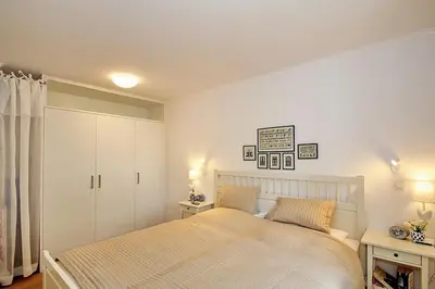 Ein Bett oder Betten in einem Zimmer der Unterkunft Modernes Strandhus Modernes Strandhus Appartement 109
