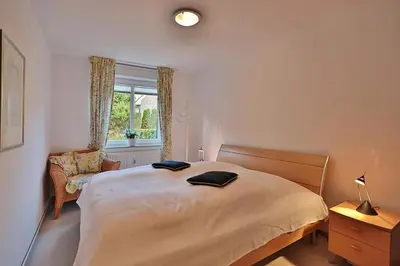 Ein Bett oder Betten in einem Zimmer der Unterkunft Domizil Strandburg Domizil Strandburg Appartement 16