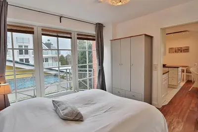 Ein Bett oder Betten in einem Zimmer der Unterkunft Haus Parkblick, Timmendorfer Strand Haus Parkblick Appartement 07