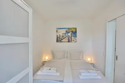 Ein Bett oder Betten in einem Zimmer der Unterkunft Haus am Höppnerweg 5 Haus am Höppnerweg 5 Appartement 09