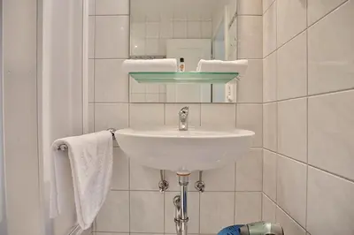 Ein Badezimmer in der Unterkunft Gorch-Fock-Straße 20a Gorch-Fock-Straße 20a Appartement 1