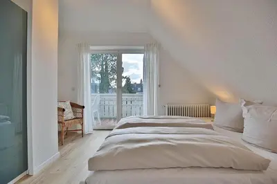 Ein Bett oder Betten in einem Zimmer der Unterkunft Gorch-Fock-Straße 20a Gorch-Fock-Straße 20a Appartement 2