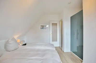 Ein Bett oder Betten in einem Zimmer der Unterkunft Gorch-Fock-Straße 20a Gorch-Fock-Straße 20a Appartement 2