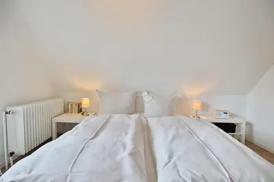 Ein Bett oder Betten in einem Zimmer der Unterkunft Gorch-Fock-Straße 20a Gorch-Fock-Straße 20a Appartement 2