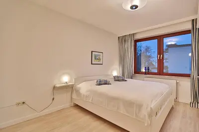 Ein Bett oder Betten in einem Zimmer der Unterkunft Haus Kastanienallee 3 Haus Kastanienallee 3 Appartement 6
