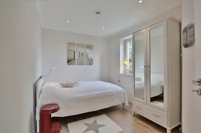 Ein Bett oder Betten in einem Zimmer der Unterkunft Parkresidenz Bergstraße 52 Parkresidenz Bergstraße 52 Appartement 3
