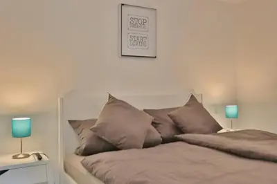 Ein Bett oder Betten in einem Zimmer der Unterkunft Haus Wolburgstraße Haus Wolburgstrasse Appartement 23