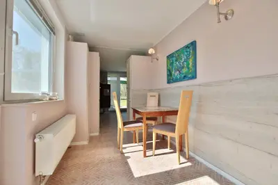 Ein Sitzbereich in der Unterkunft Ferienbungalow Erlenweg 20 Erlenweg 20 Appartement 2 Niendorf Ostsee