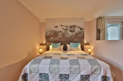 Ein Bett oder Betten in einem Zimmer der Unterkunft Ferienbungalow Erlenweg 20 Erlenweg 20 Appartement 3 Niendorf Ostsee