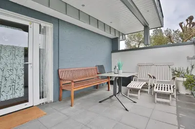 Ein Balkon oder eine Terrasse in der Unterkunft Ferienbungalow Erlenweg 20 Erlenweg 20 Appartement 3 Niendorf Ostsee