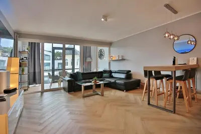 Ein Sitzbereich in der Unterkunft Seaside Seaside Appartement 18