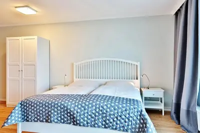 Ein Bett oder Betten in einem Zimmer der Unterkunft Haus Seebrücke Haus Seebrücke Appartement 03