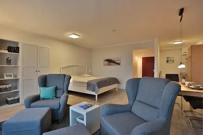 Ein Sitzbereich in der Unterkunft Haus Seebrücke Haus Seebrücke Appartement 08