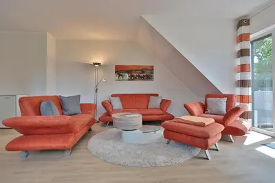 Ein Sitzbereich in der Unterkunft Haus Bergstrasse 4 Haus Bergstraße 4 Appartement 9